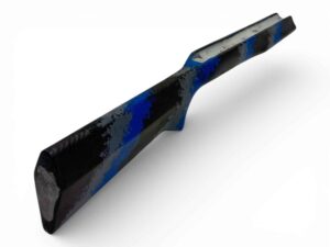 McMillan Bruno Stock - Heavy Varmint W/ Carbon Fiber Shell - Partial Inlet for BAT B Action - HV Barrel Channel - Molded In Banded Carbon Dark Gray, Medium Blue, Clear Base